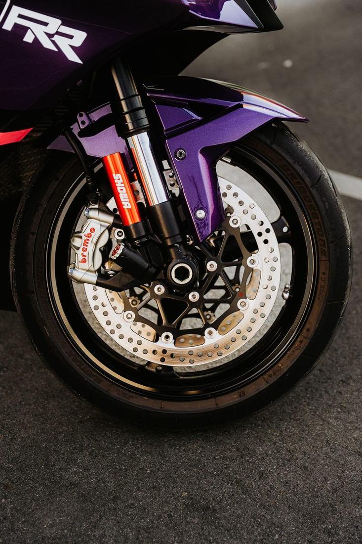 Motorcycle front suspension fork and Brembo brake caliper